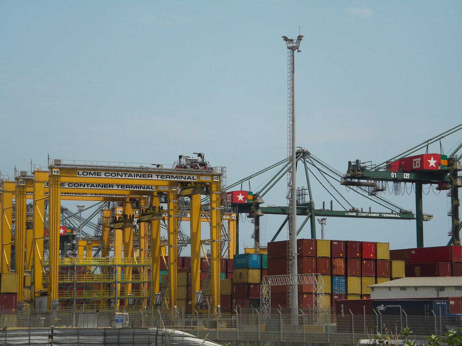 Container terminal cranes and stacked containers